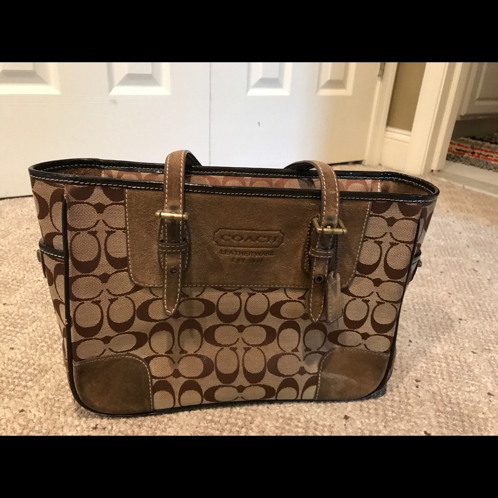 Signature coach handbag with tan suede detail
